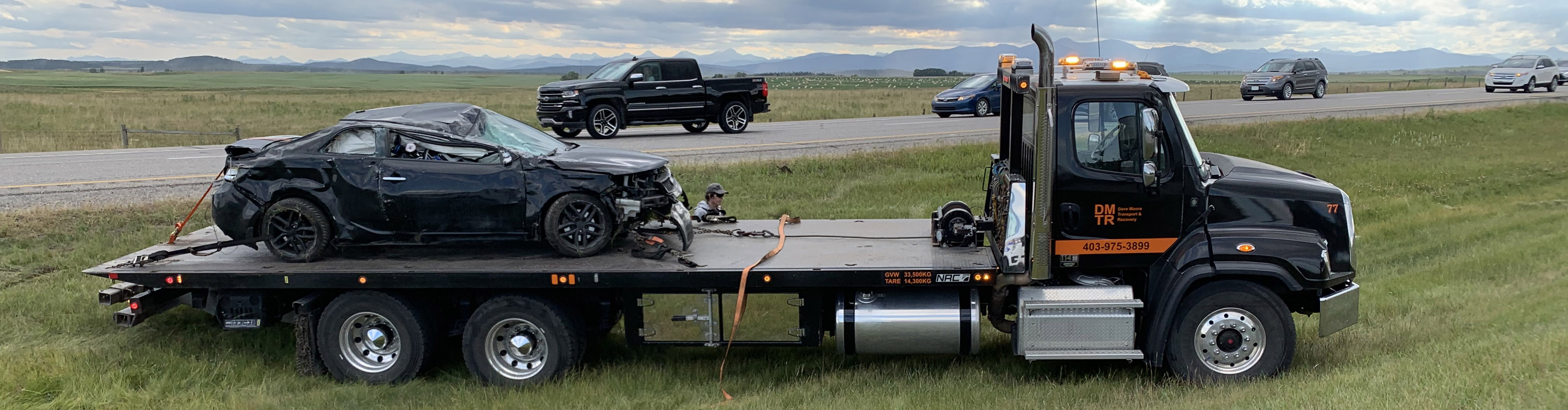accient car on flatbed